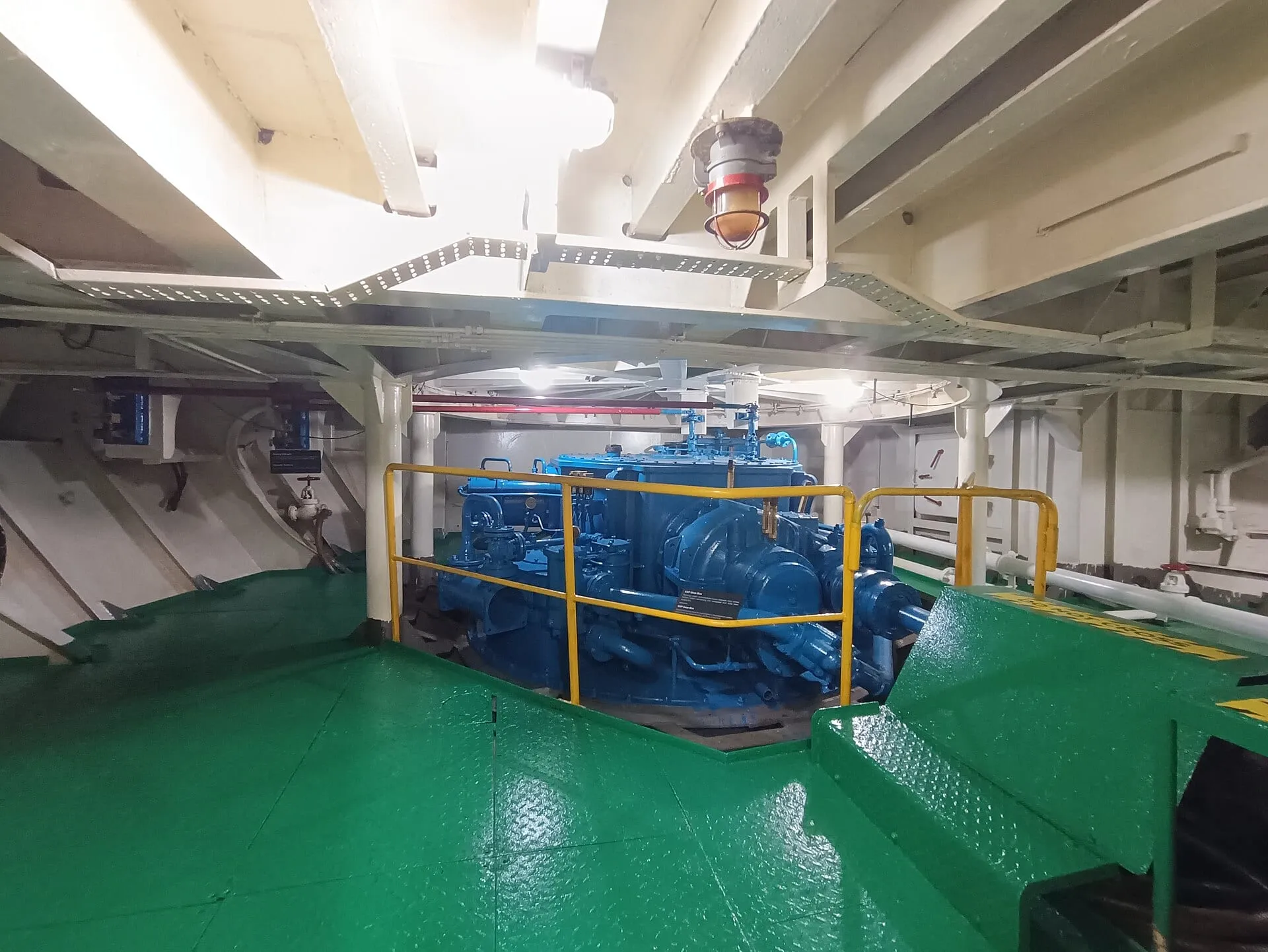Machinery space of a vessel, gangways and pipework